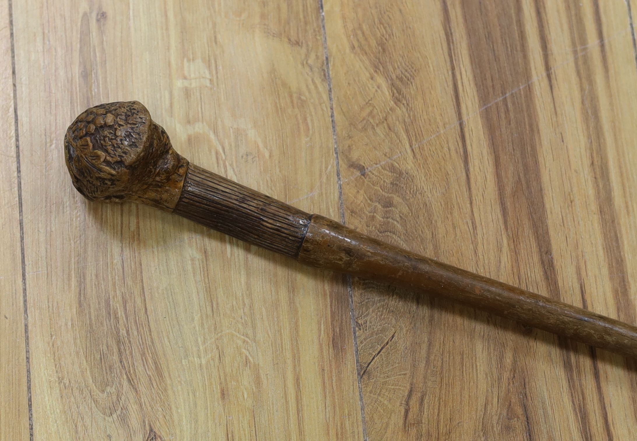 A 19th century folk art walking stick, 89 cms long.